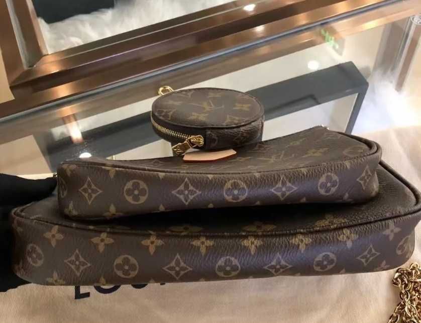 Bolsa multiacessórios Louis Vuitton