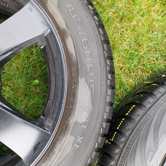 Koła zimowe 5x100 185/60/15 alufelgi czarne Dezent opon Nokian VW polo