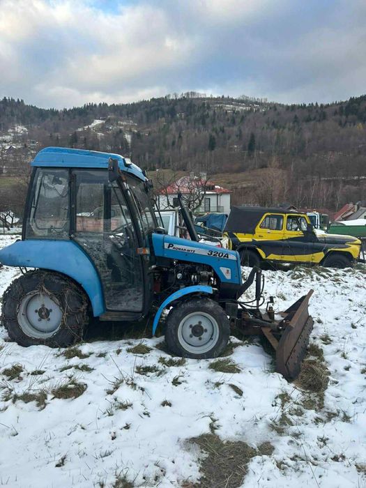 Pronar MTZ 320a 4x4 z pługiem i łańcuchami