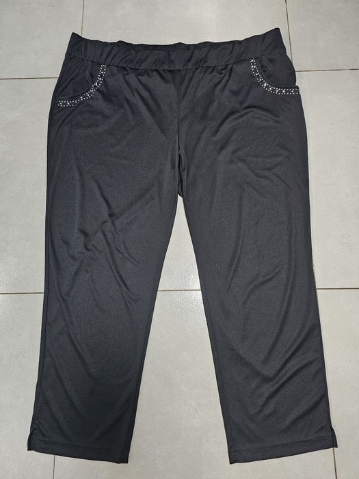 Eleganckie spodnie z aplikacją roz.56 (8 XL) czarne , połyskujące,