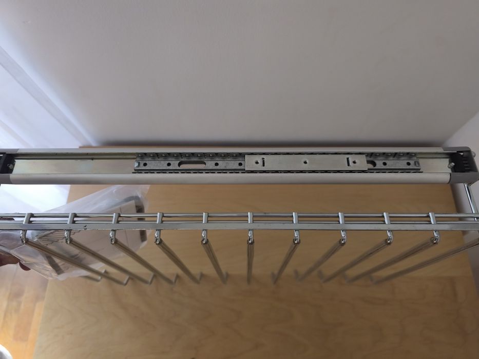 Porta calças deslizante