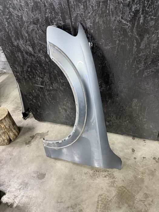 Крило ліве Audi A4 B8 Allroad 12-16 рік рестайл код фарби LX7R \ Крыло