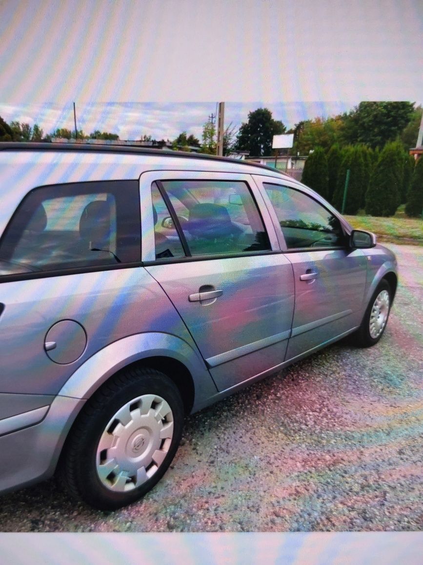 Sprzedam samochód osobowy marki Opel Astra H Combii