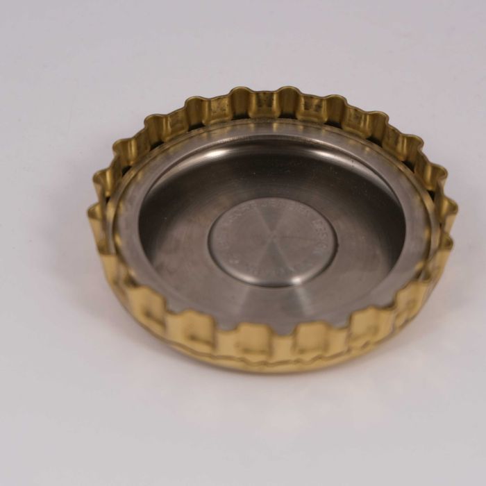 Otwieracz do butelek kapsel, Georg Jensen, Dania, lata 80.