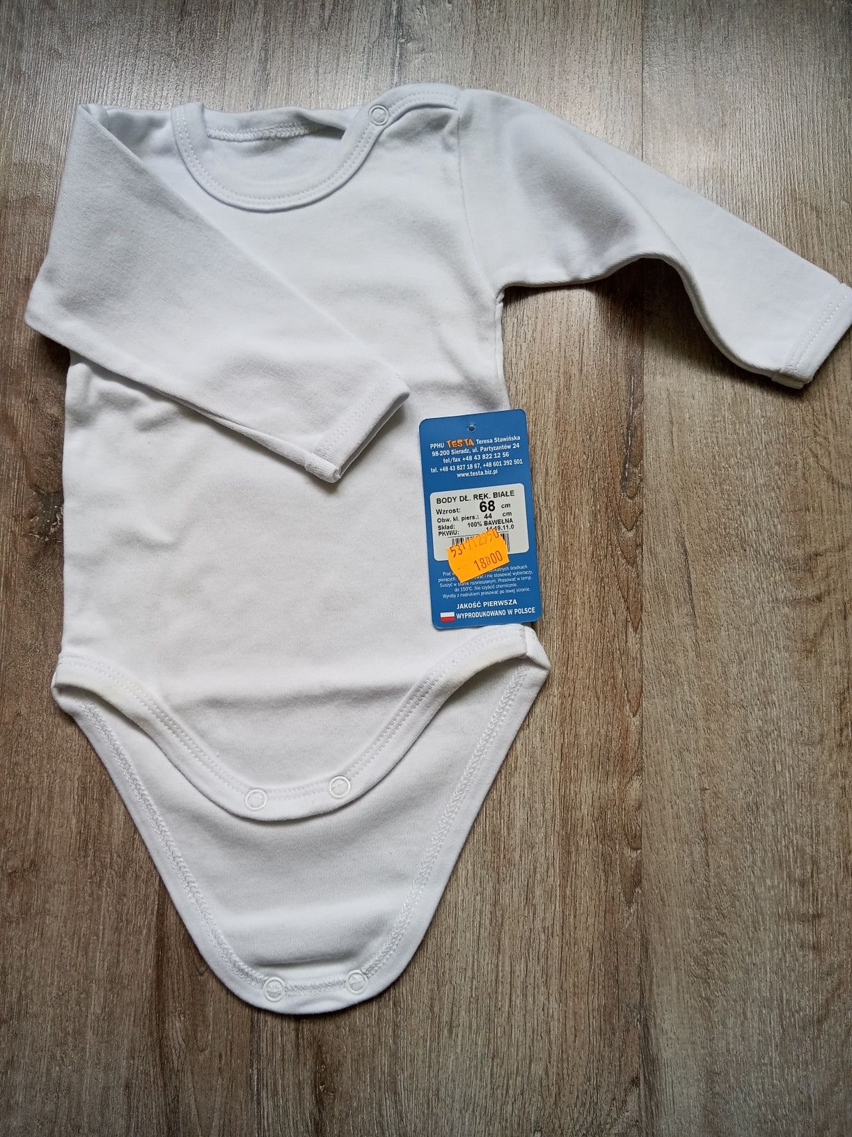 Białe body z długim rękawkiem
