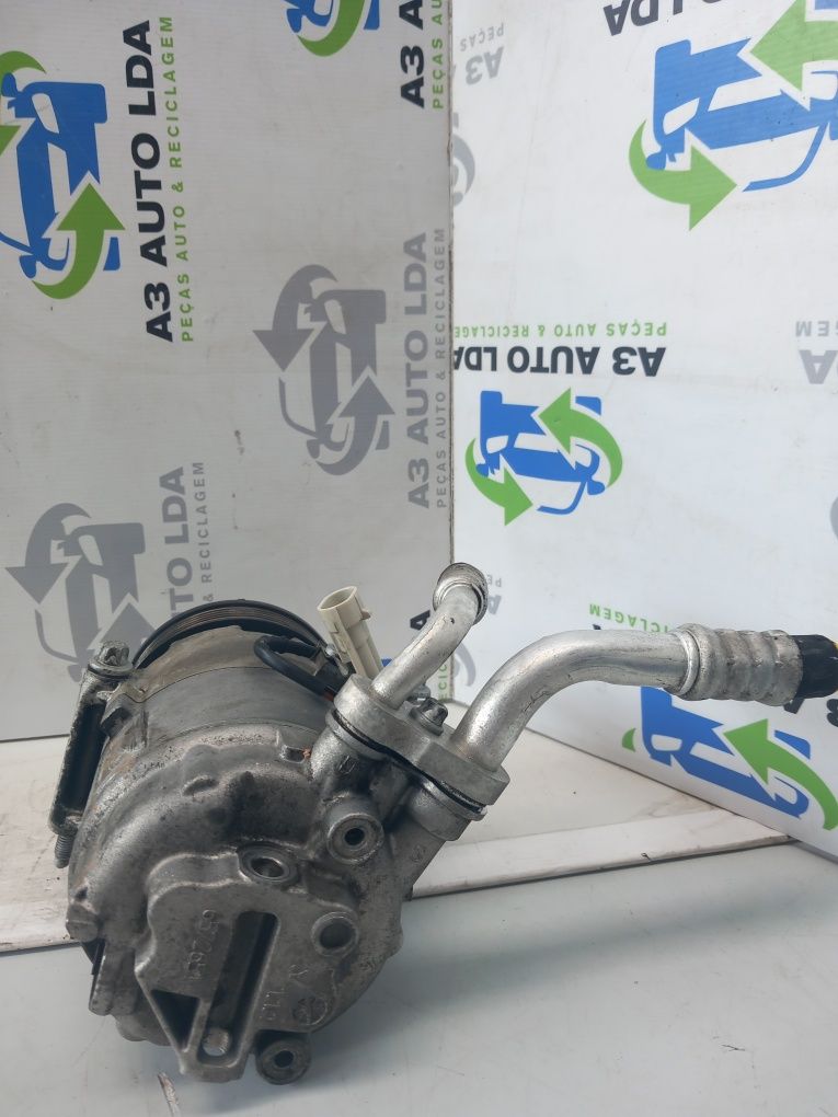 Compressor de ar condicionado Opel Astra J