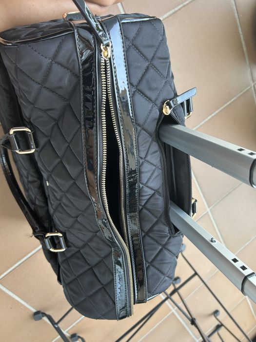 Mala de viagem ou computador Parfois