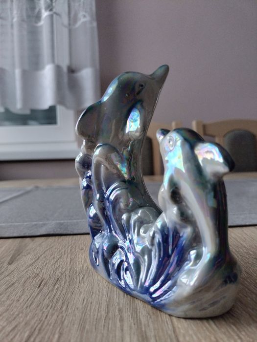 Świecznik z delfinkami