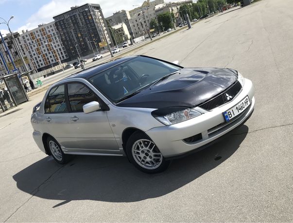 Лансер 9 2.0 автомат