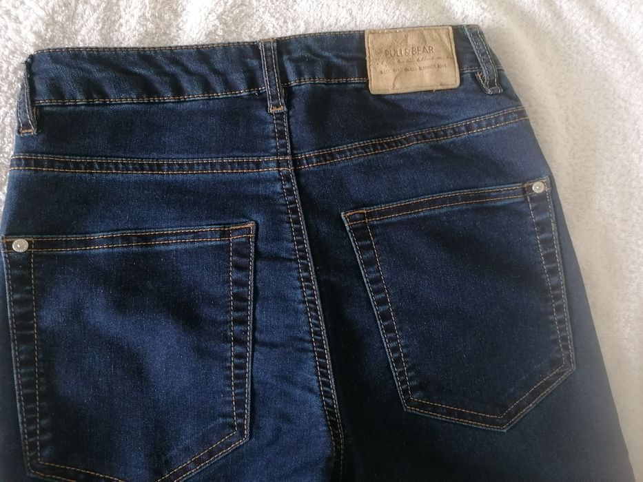 NIE NOSZONE granatowe spodnie PULL&BEAR rozmiar 34