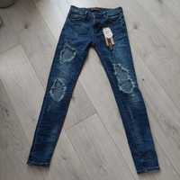 Spodnie jeans damskie