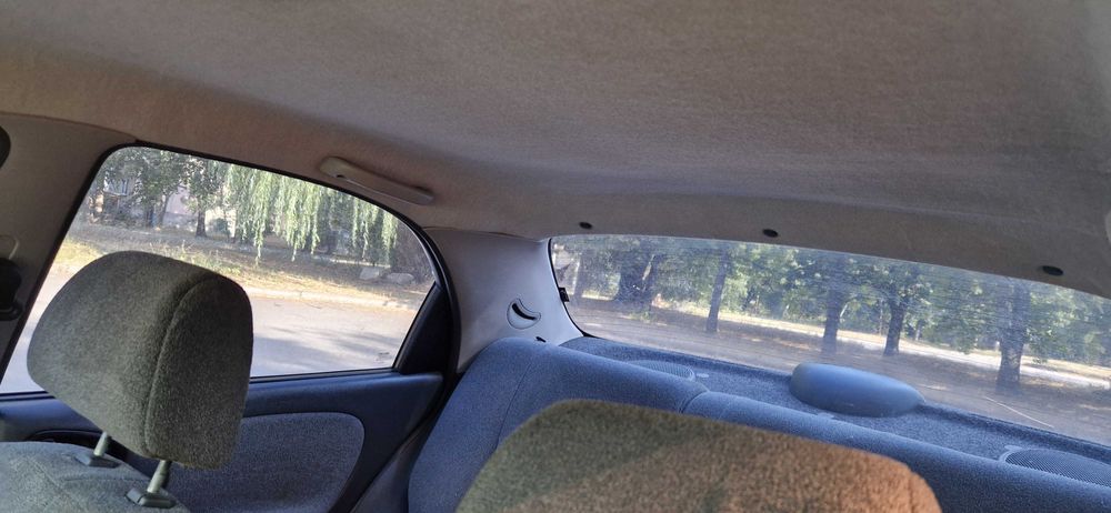 Деу Ланос 1.5 червоний