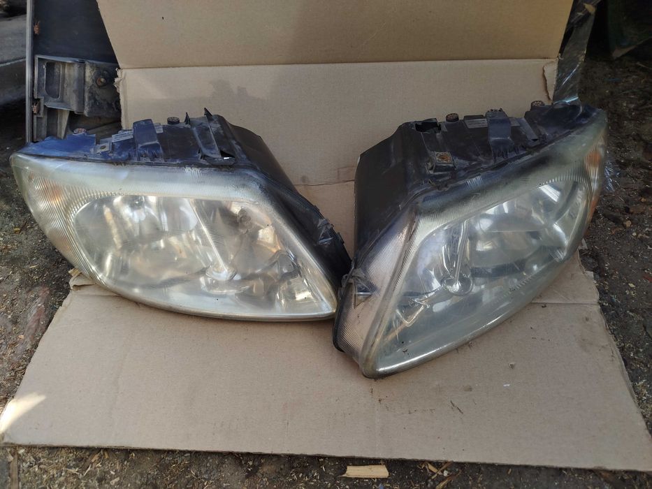 Фари передні Додж Dodge Caravan 4 Chrysler Voyager 4 (2001-2007)