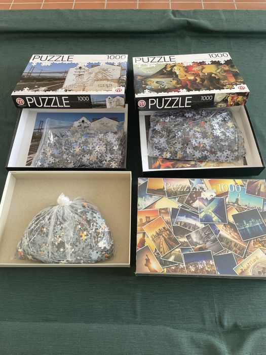 Conjunto de 4 puzzles de 1000 peças( 1 deles por abrir)