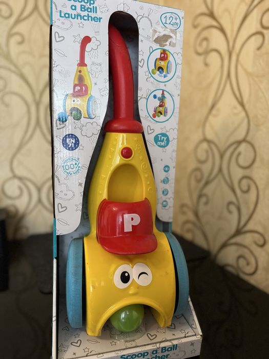 Іграшка-штовхач для діток  Scoop a ball