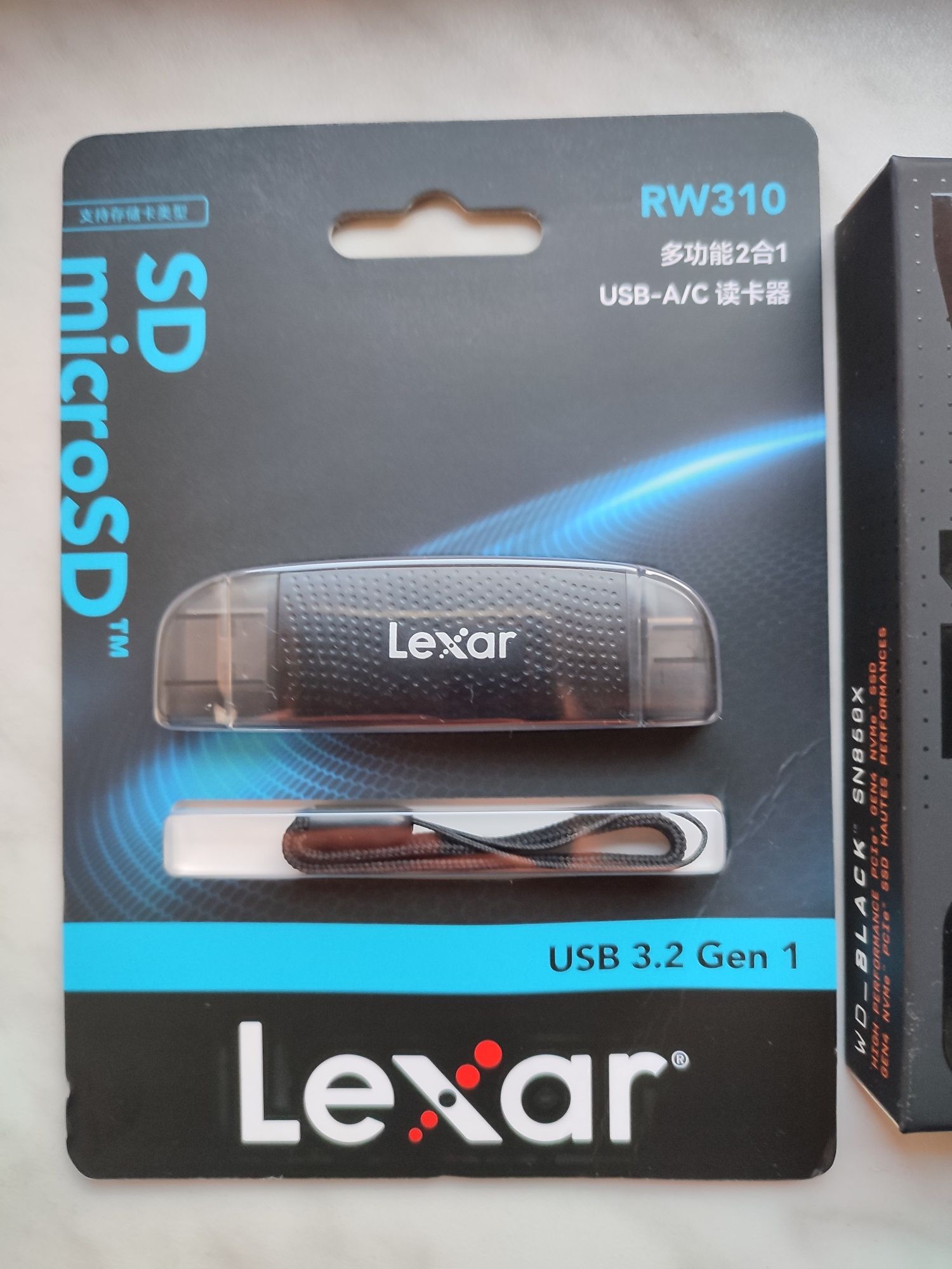 Lexar czytnik kart SD + dwa dyski SSD: WD Black SN850X GAME DRIVE 4TB.