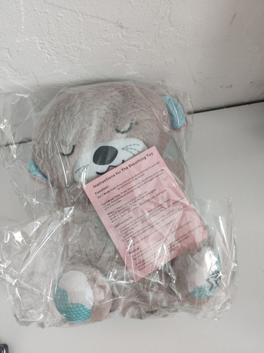 Nowa wydra miś szumis oddychająca świecąca 4 tryby maskotka