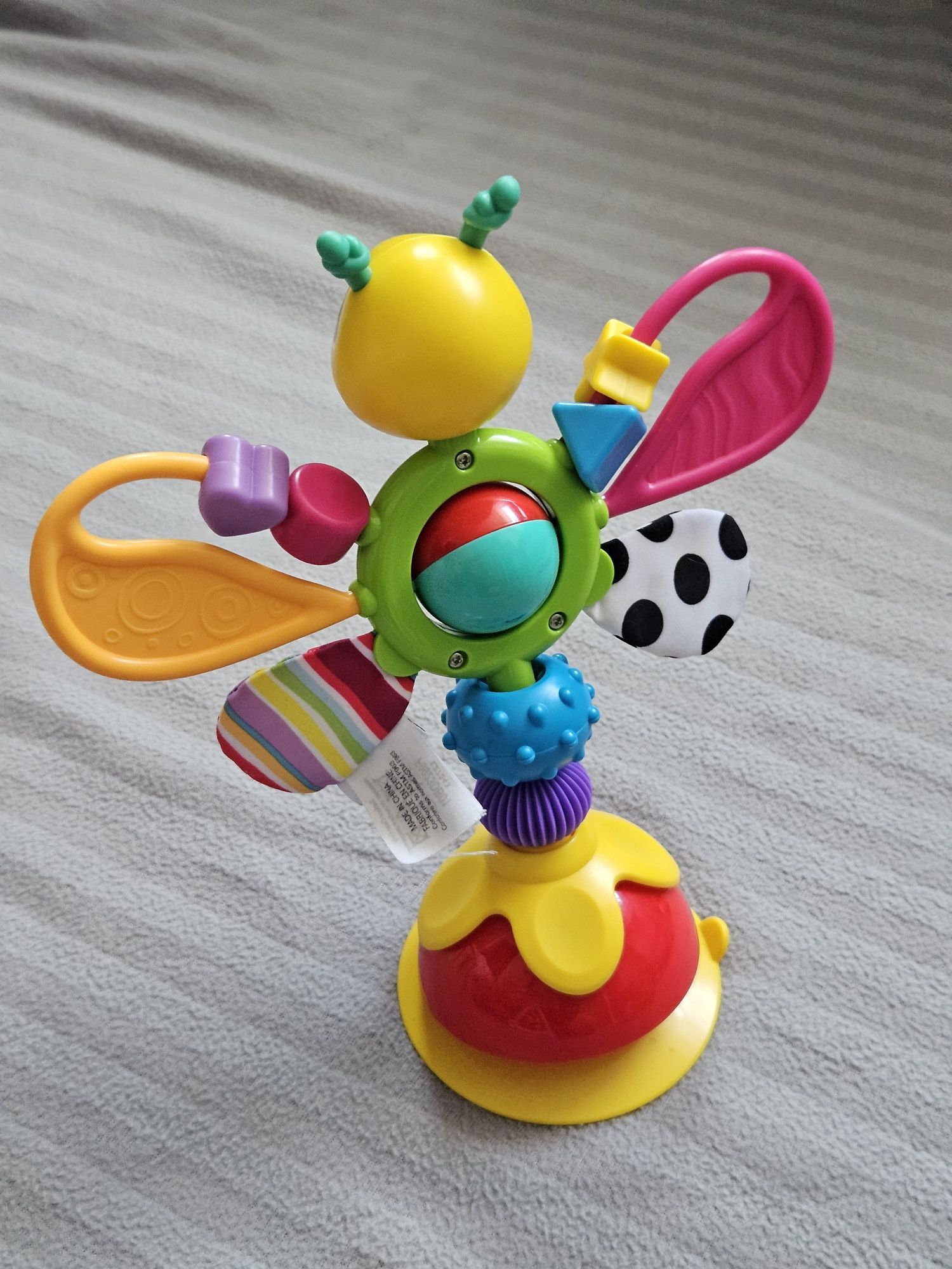 Motyl Lamaze na przyssawce do stolika