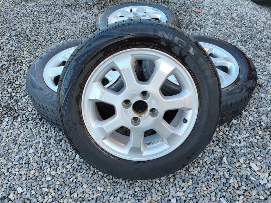 Koła letnie 15 4x100 Opel Astra