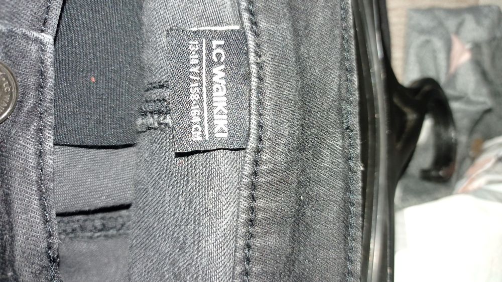 Джинсы стрейчеві чорного кольору на зріст 158-164