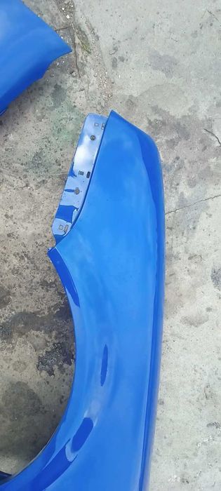 Błotnik Golf 4 LW5Z