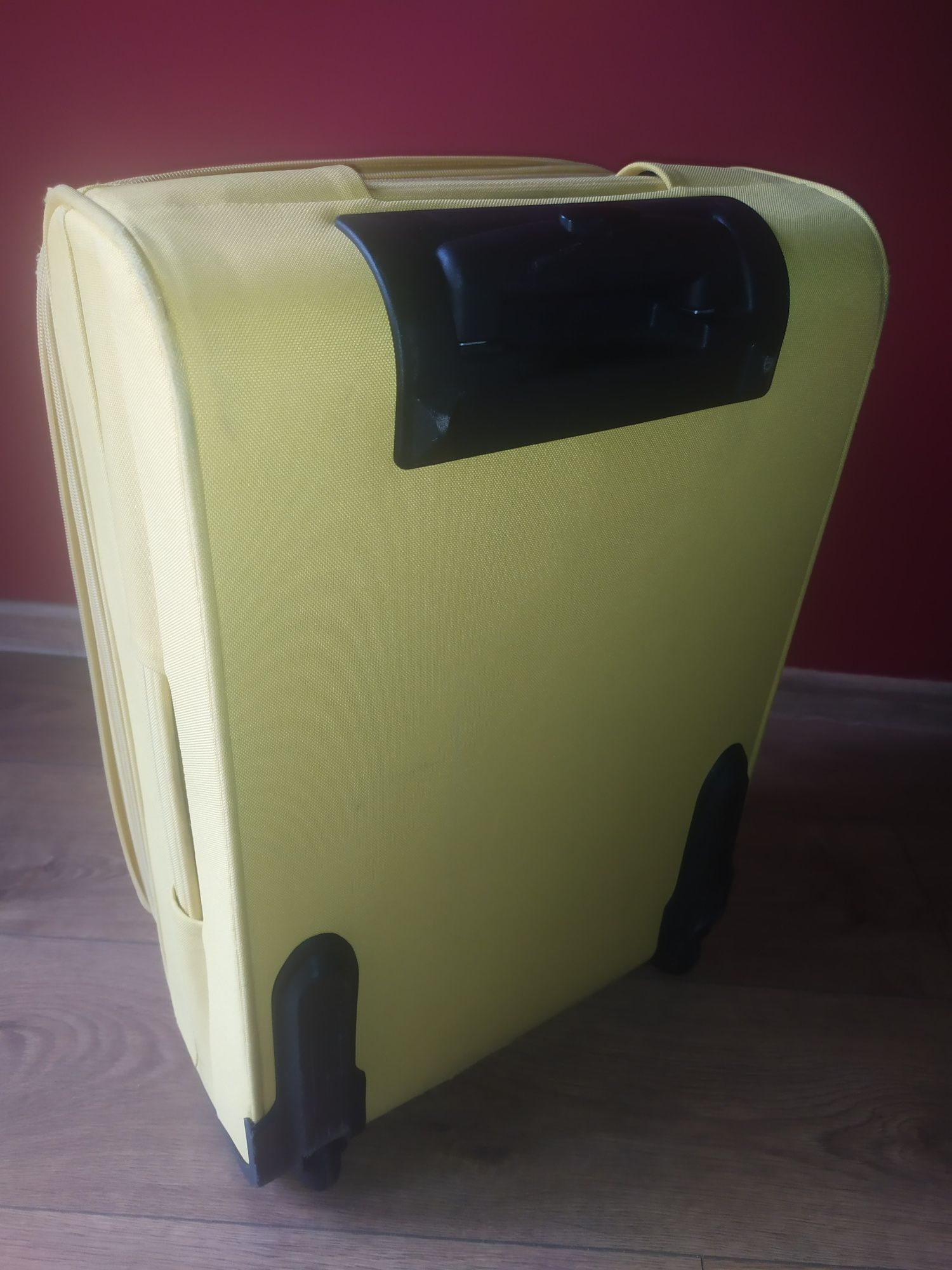 Żółta walizka kabinowa rozszerzana na 2 kółkach Samsonite 54x37x27cm