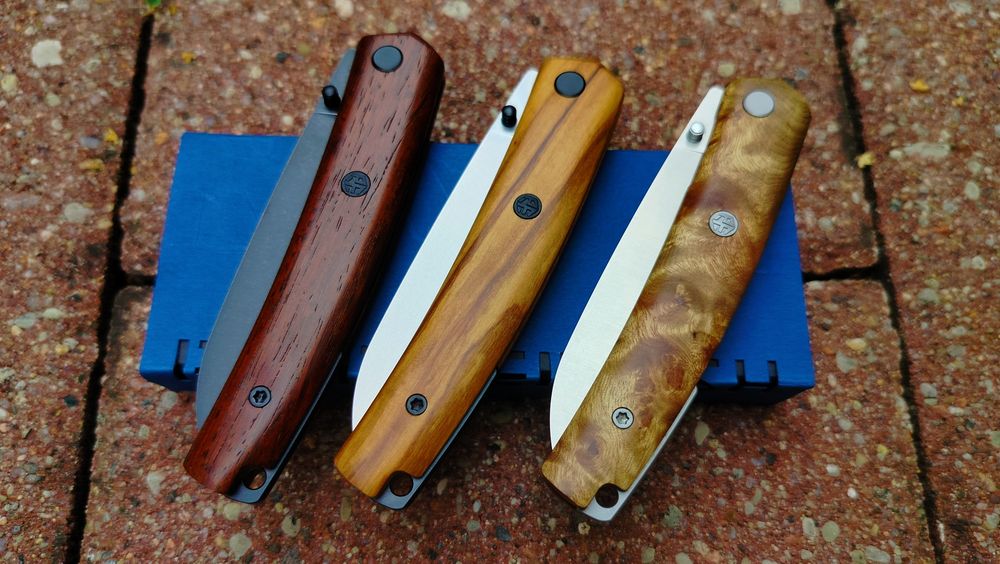 Nóż Petrified Fish 719 drewno