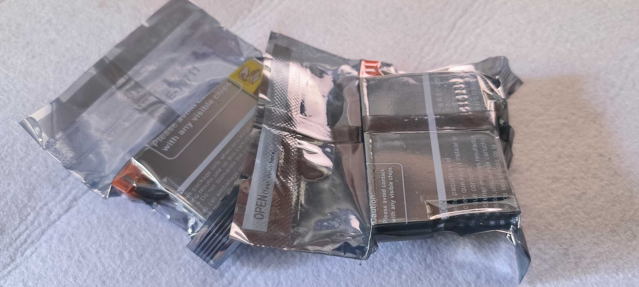 Tusz Epson T0711 czarny (2 sztuki) i T0713 trzy kolory.