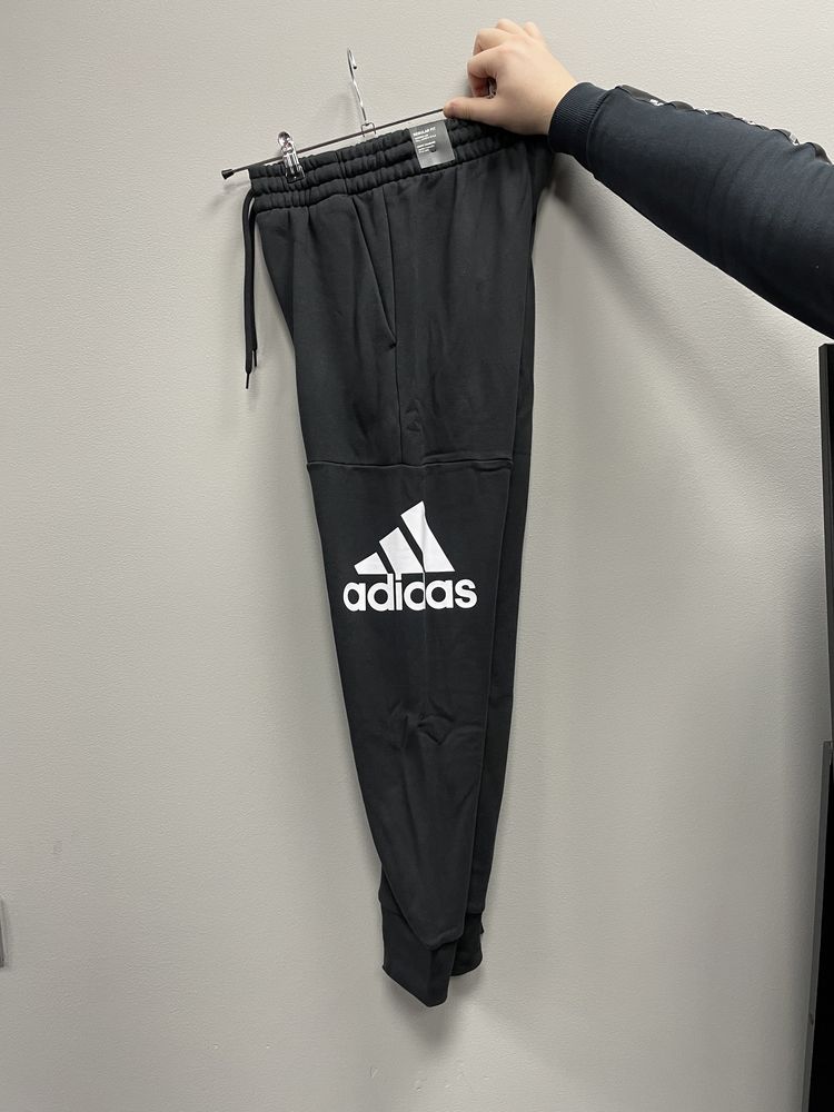 Спортивні штани adidas essentials french terry tapered cuff logo