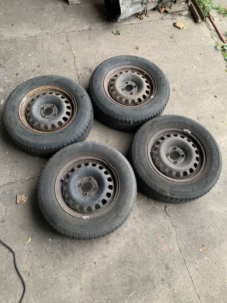 Felgi Stalowe z Oponami wielosezon 4x100 185/70/15 Et 39 Opel corsa