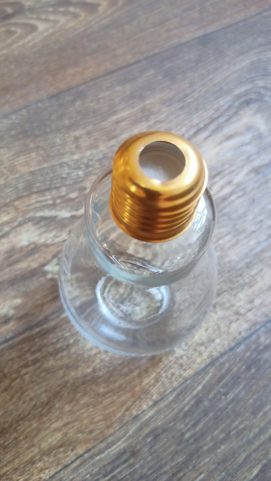 Стеклянная бытылка в форме лампы 100 мл