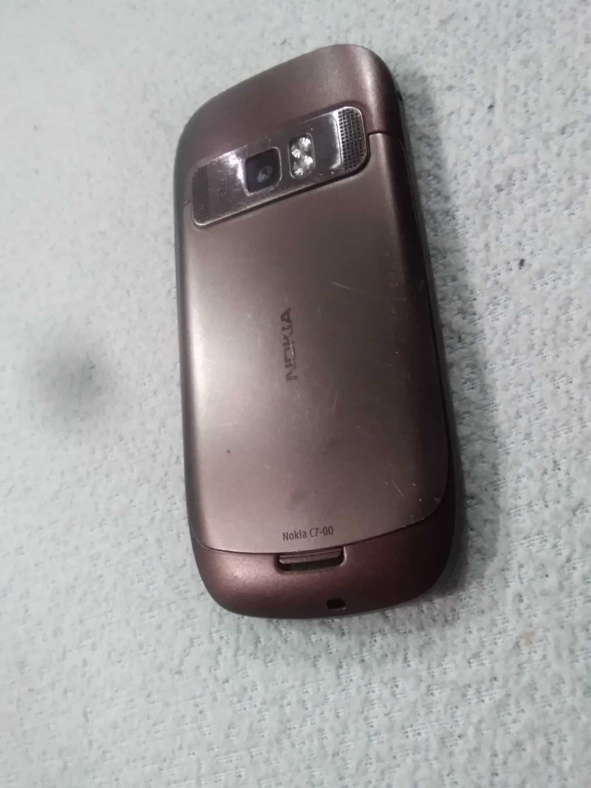 Telefon smartfon NOKIA C7-00 jak nowa stan idealny z ładowarką