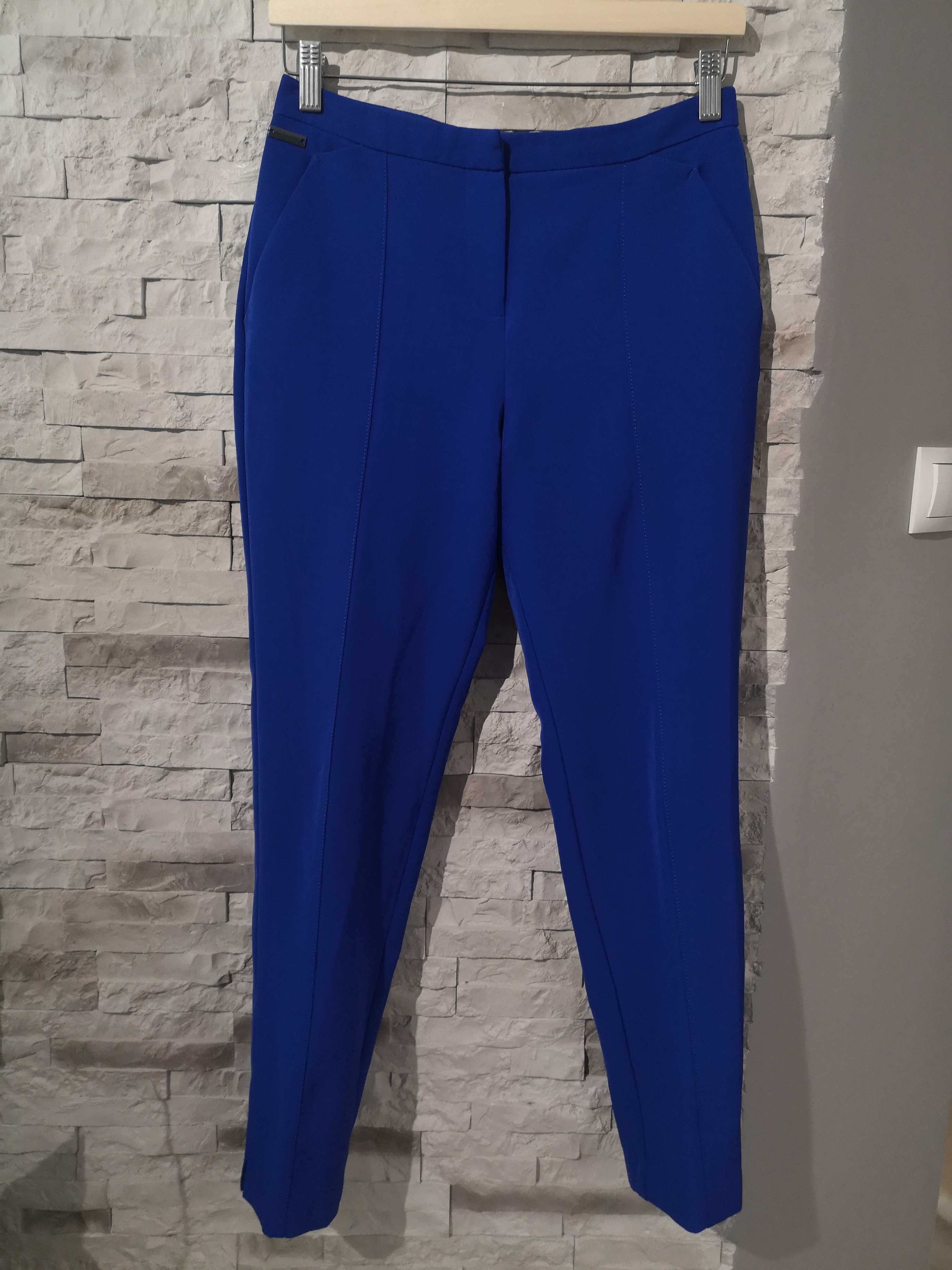Niebieskie eleganckie spodnie Primark rozmiar 36