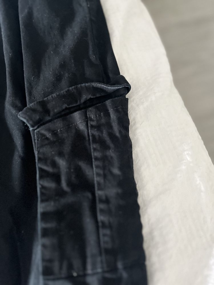 Czarne spodnie 164
