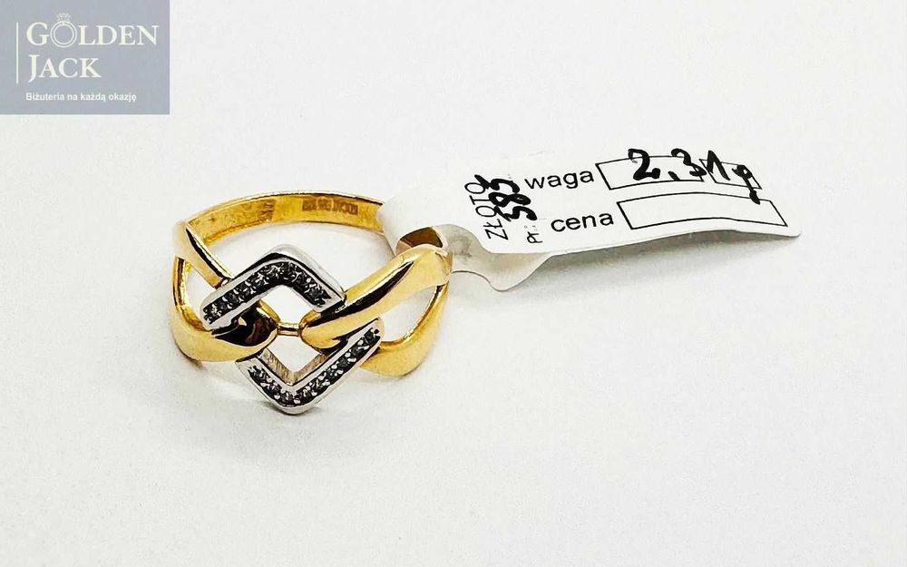 Złoty pierścionek z cyrkoniami ażurowe białe złoto p 585 roz. 16 2,31g