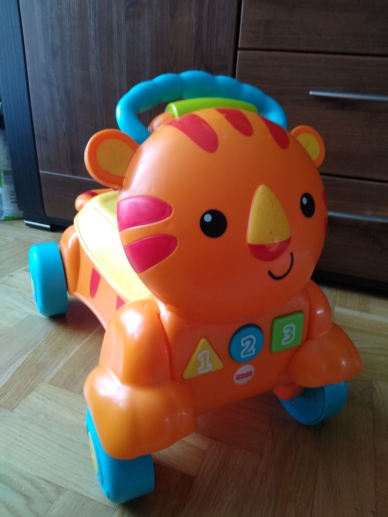 Jeździk pchacz tygrys  Fisher price