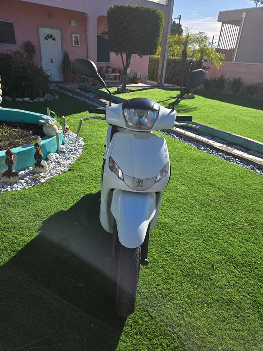 Mota peugeot 125  impecavel