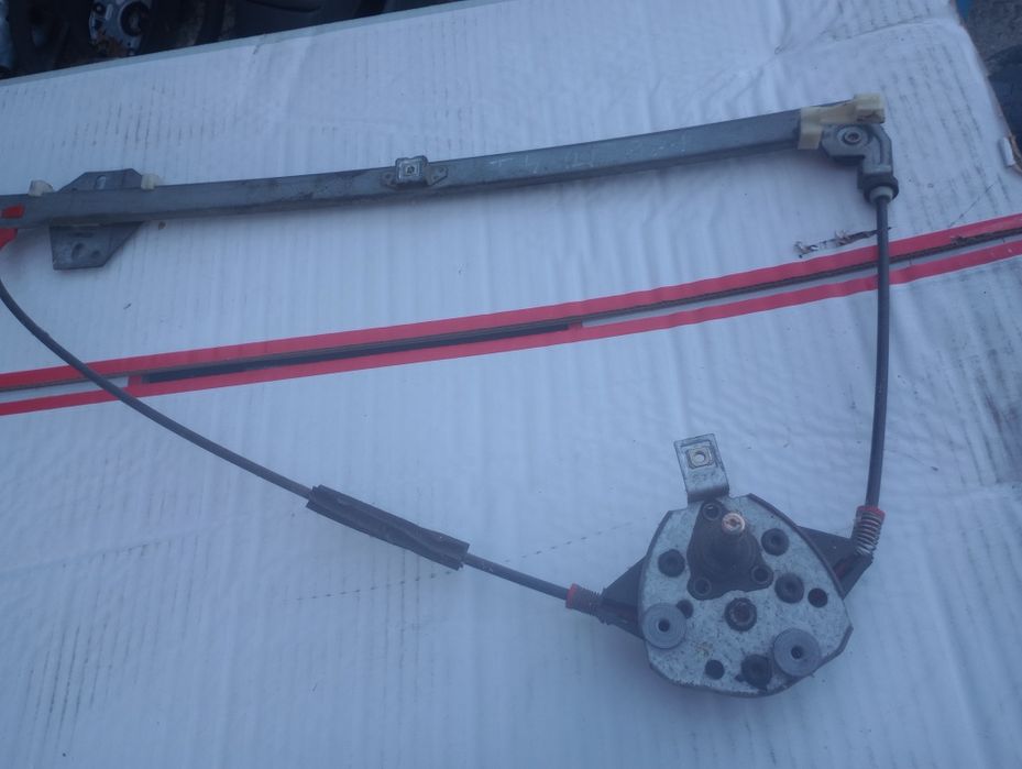 VW Transporter T4 mechanizm szyby podnośnik lewy przód manualny