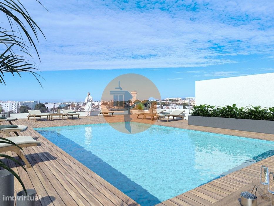 Apartamento T2 com piscina no terraço e garagem na cave - Novo - Ol...