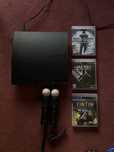 Vendo PS3 Slim + comandos + jogos