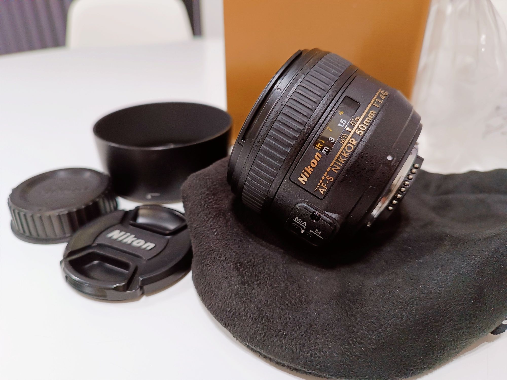 Nikon AF-S 50mm f/1.4G impecável.