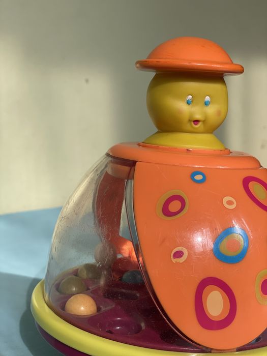 Розвиваюча іграшка, игрушка Battat Юла-мандаринка