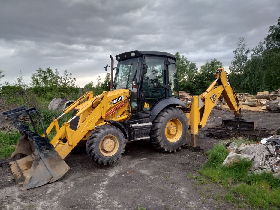 Usługi koparko-ładowarką wywóz ziemi gruzu niwelacja terenu wyburzenia