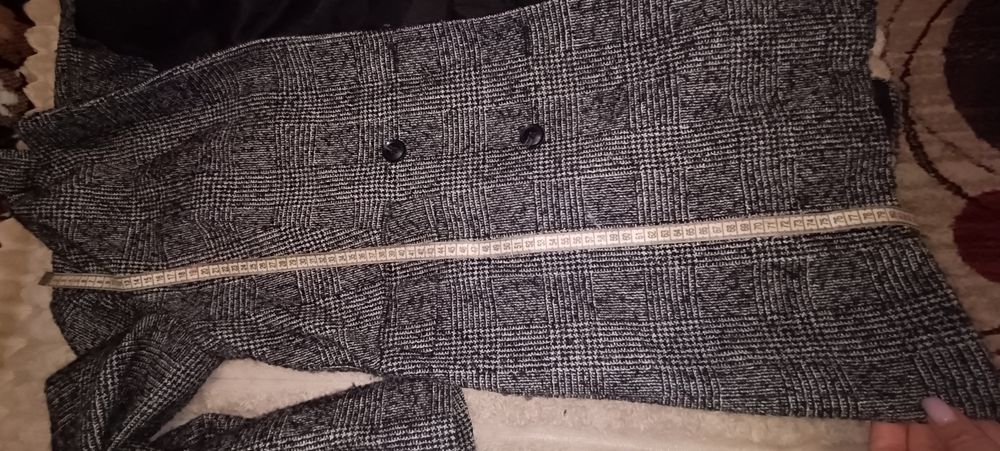 Жіноче пальто сірого кольору