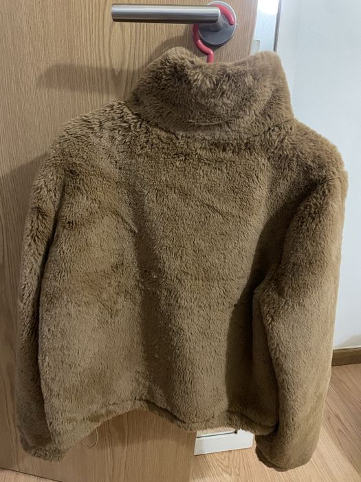 Casaco castanho pelo