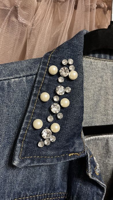 Жіноча джинсова жилетка