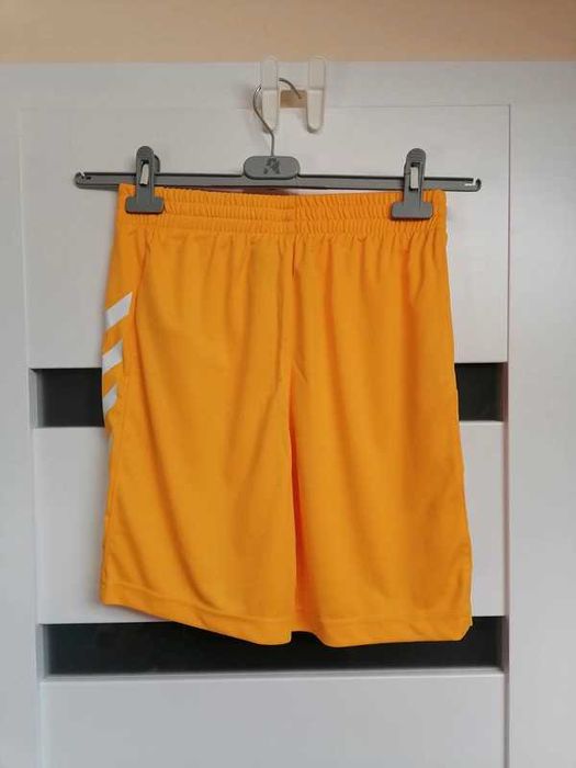 Żółte spodenki sportowe Rozmiar S Hummel