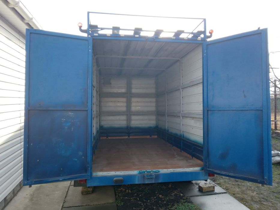 Бортовий тентований причіп