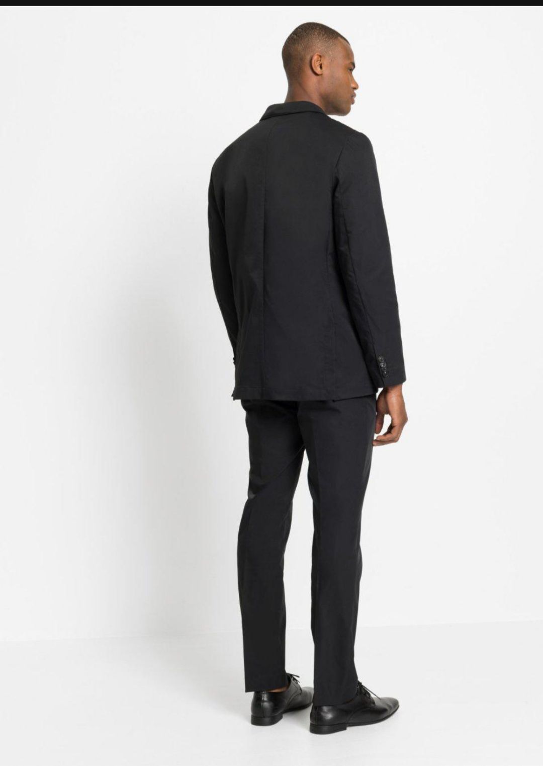 Nowy garnitur męski czarny elegancki jednorzędowy rozmiar 52