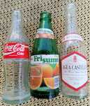 Grade Trinaranjus, garrafas de vidro Frisumo, Castello, Coke anos 90